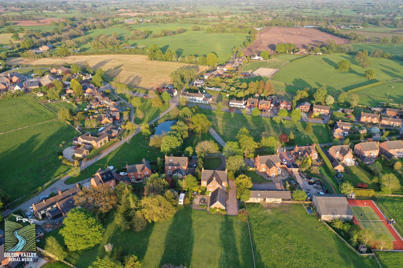 An aerial photograph of the village taken in April 2019 - image &copy; Golden Valley Aerial Media